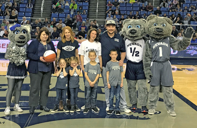 Washoe County staff and children with University of Nevada mascots.