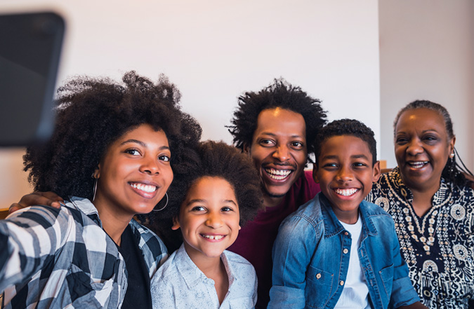 Multi-generational African American family taking a selfie