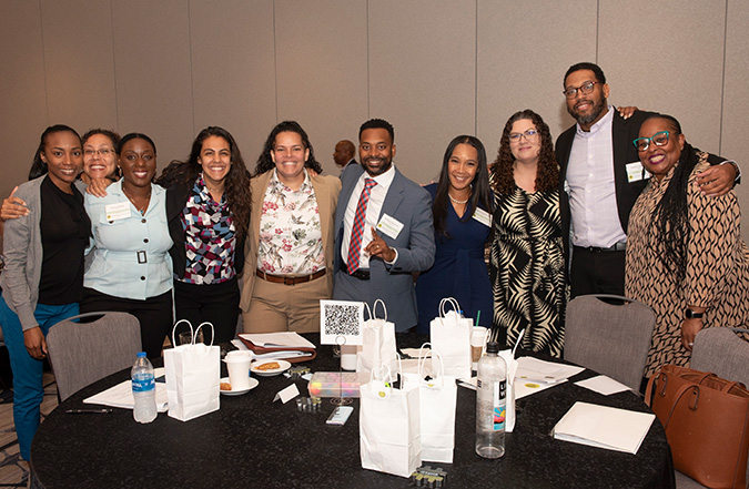 Ten of the 21 members of the MPLD program's sixth cohort pose for a group photo during their recent graduation ceremony in Washington, DC. 